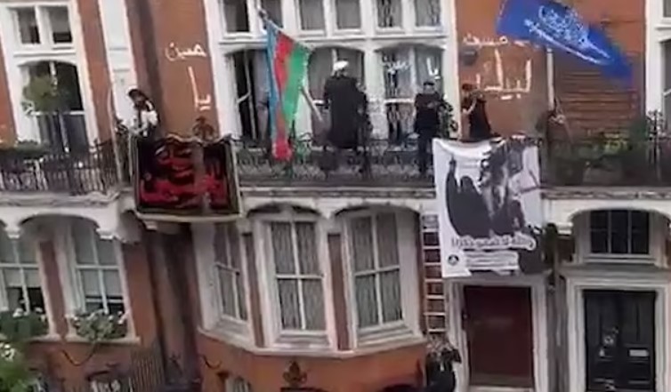 Protesters storm Azerbaijani Embassy in London and take down flag