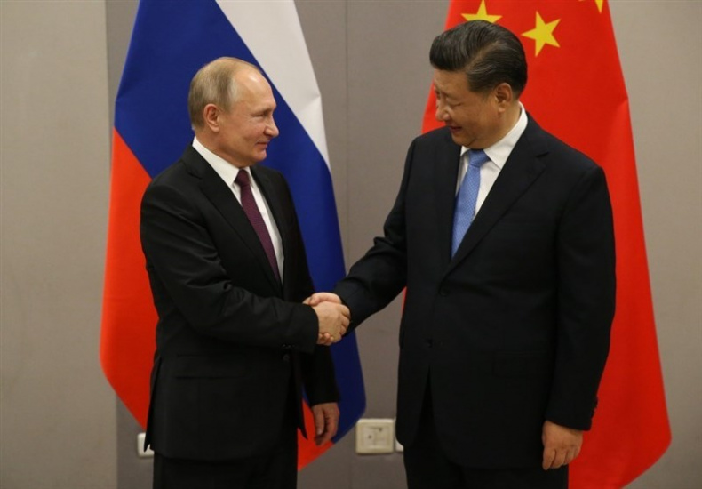 سفر پوتین به پکن، از روابط نمادین برخوردار است